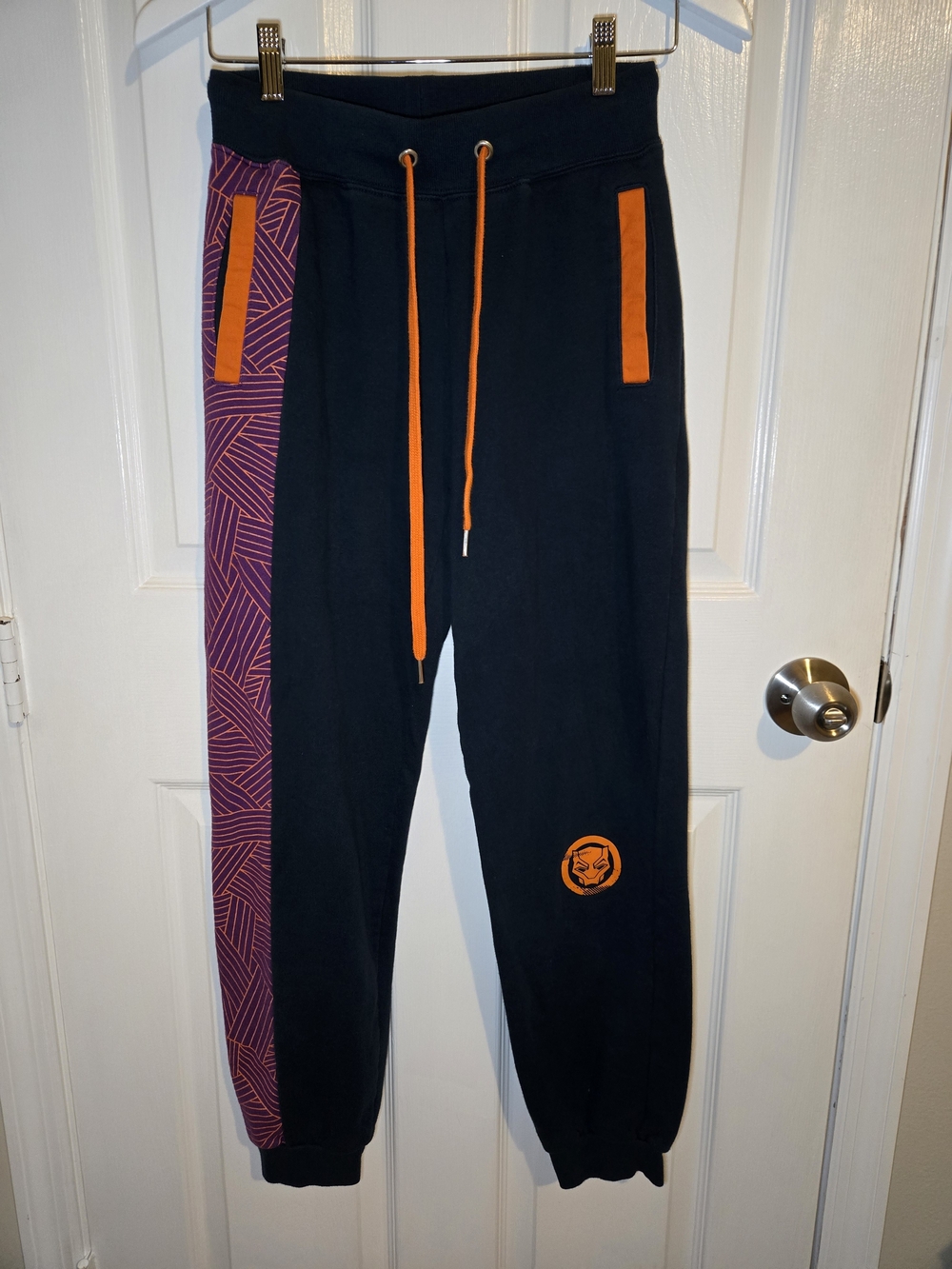 Marvel Black Joggers with Orange Accents and Purple Side Panel